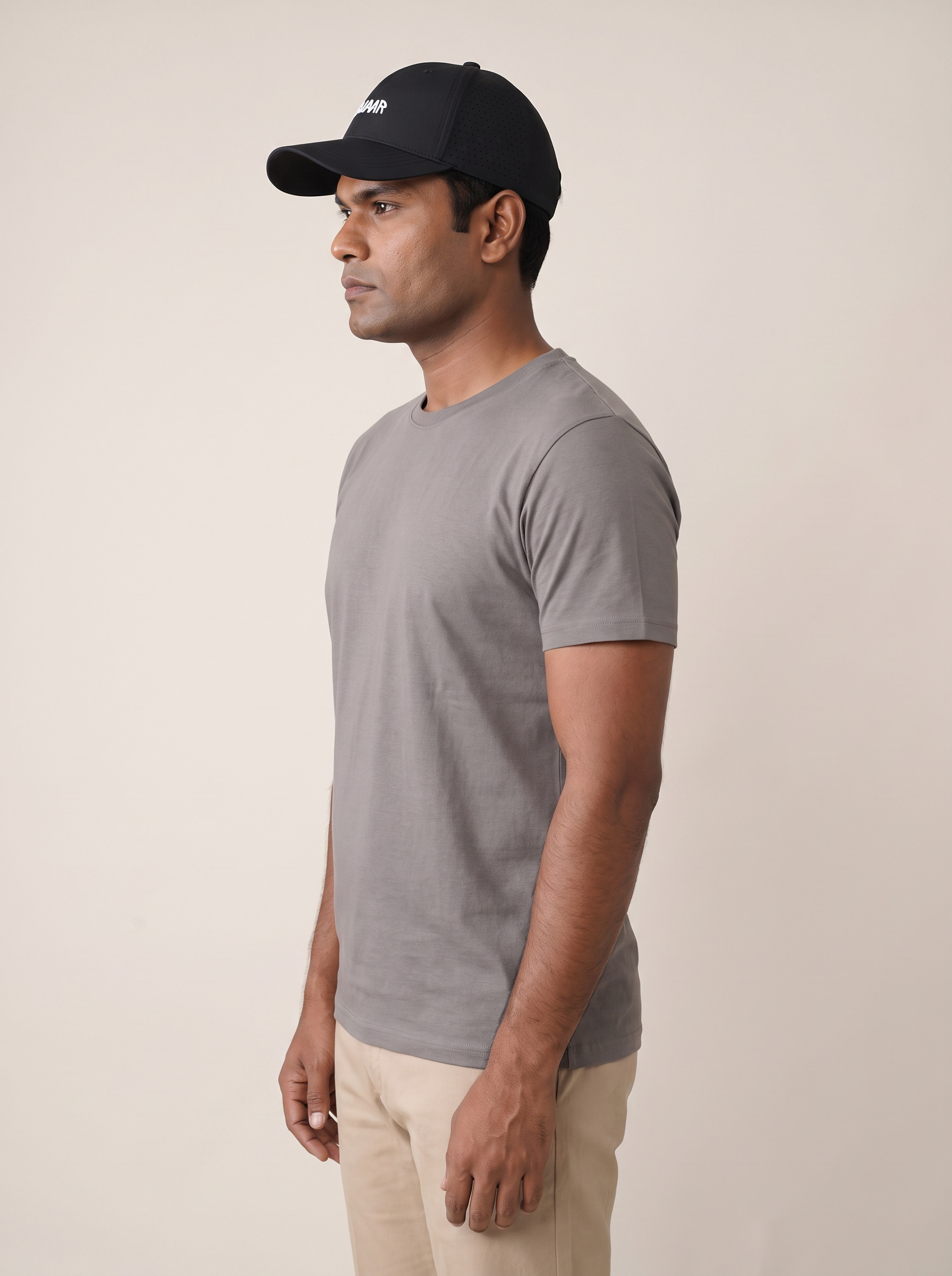 Active Cap in Noor Black, side view, with perforated side panels for airflow