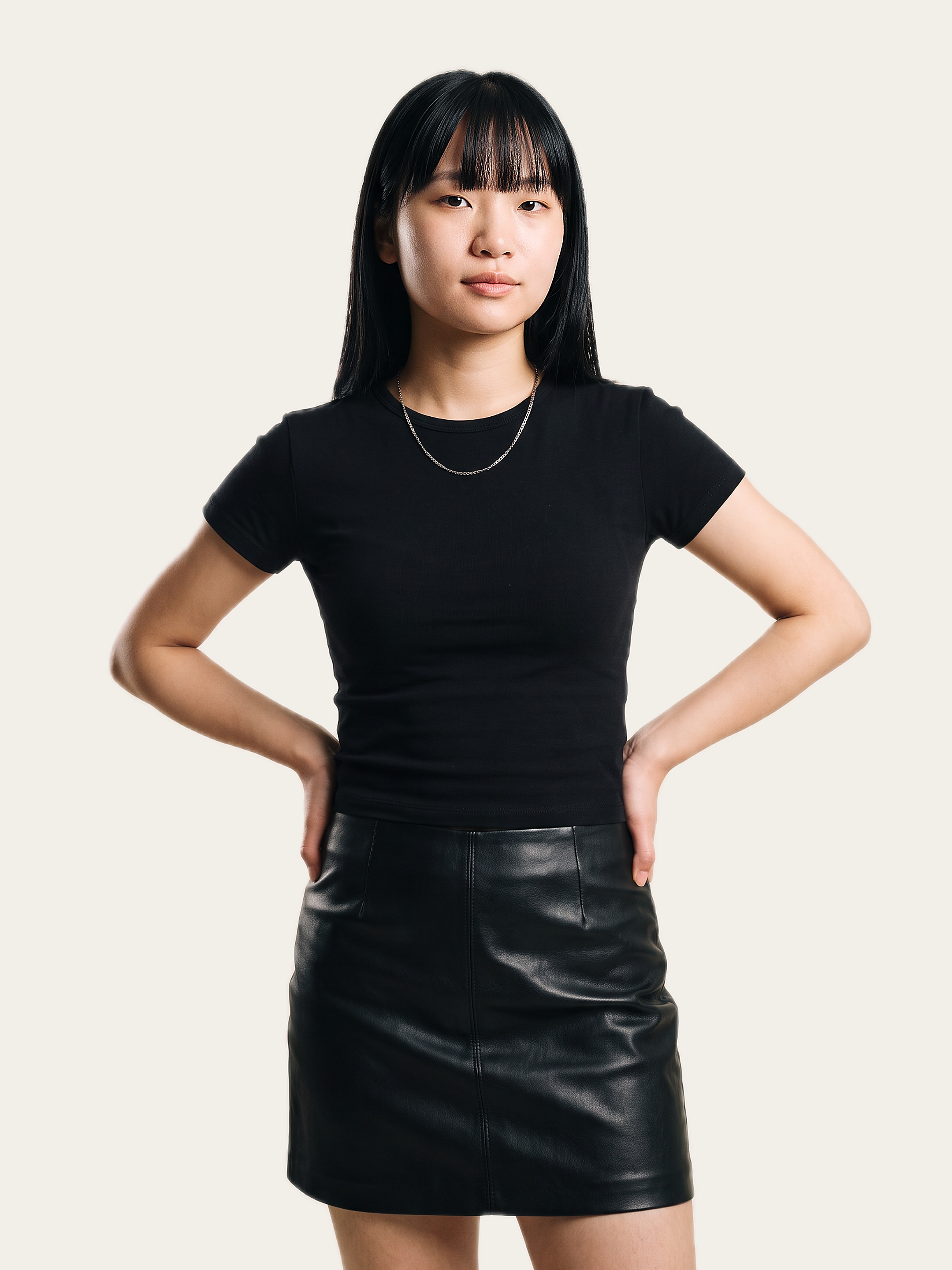 CORE Baby Tee in Noor Black, worn by a model