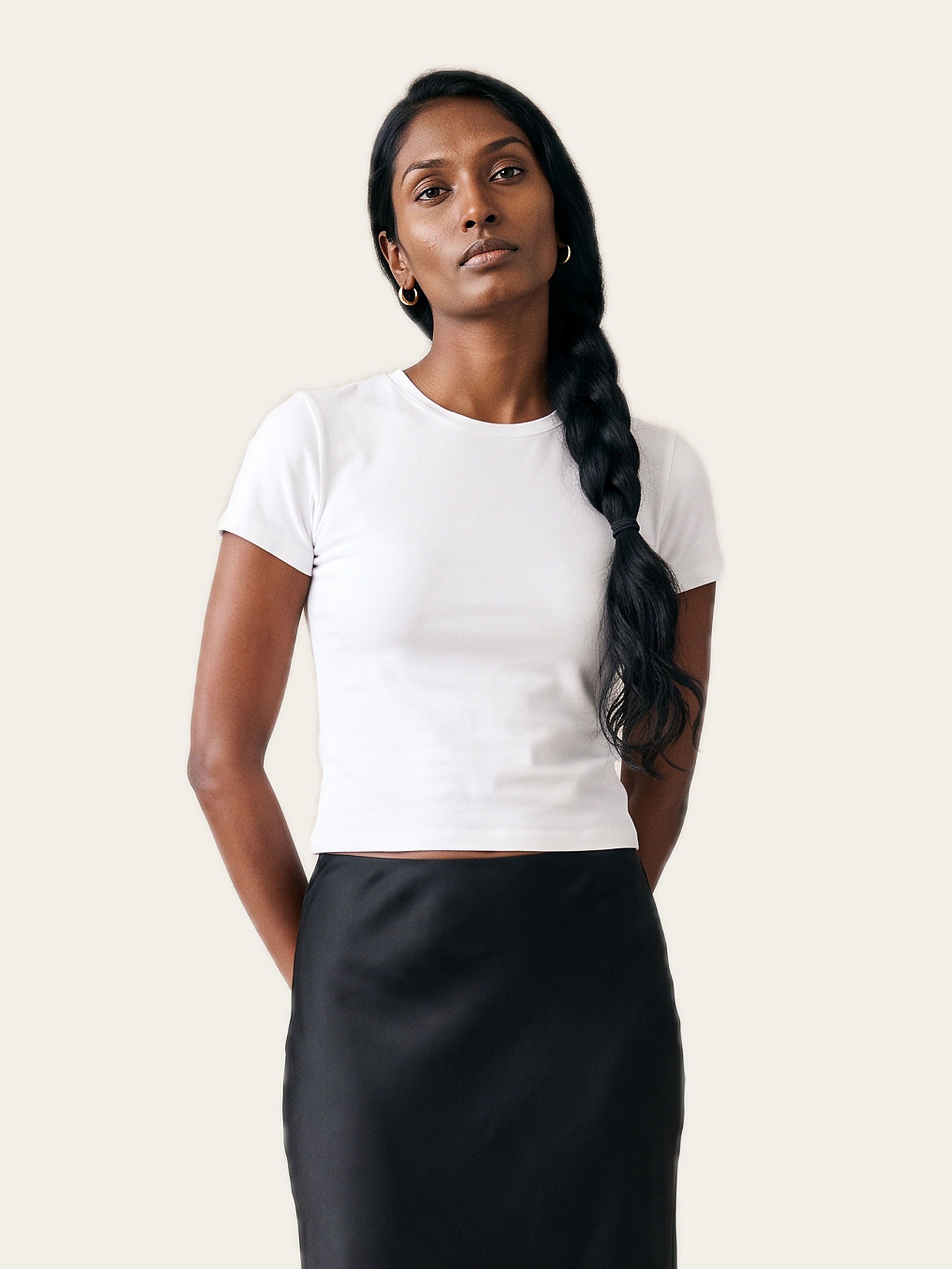 CORE baby tee in Rui White, with a black skirt