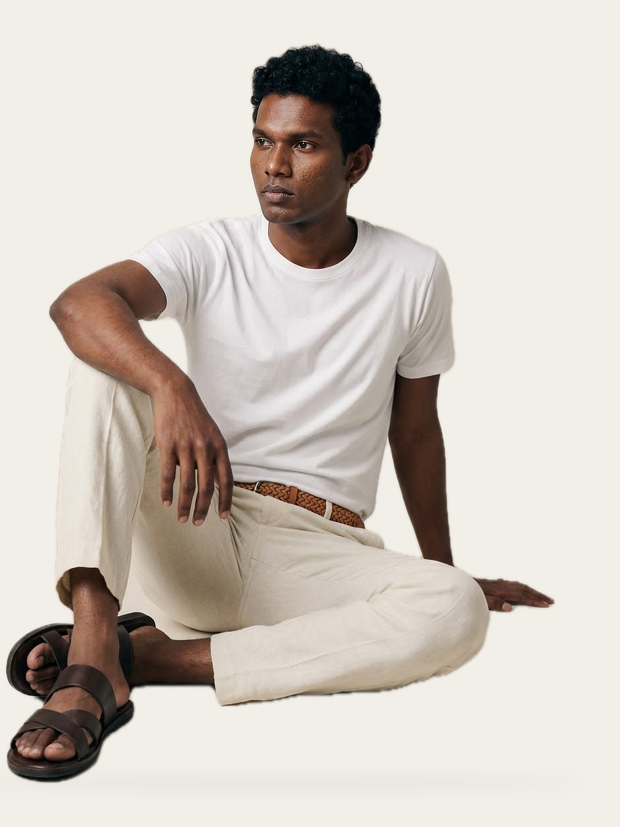 CORE crew tee in Rui White, worn with cream trousers