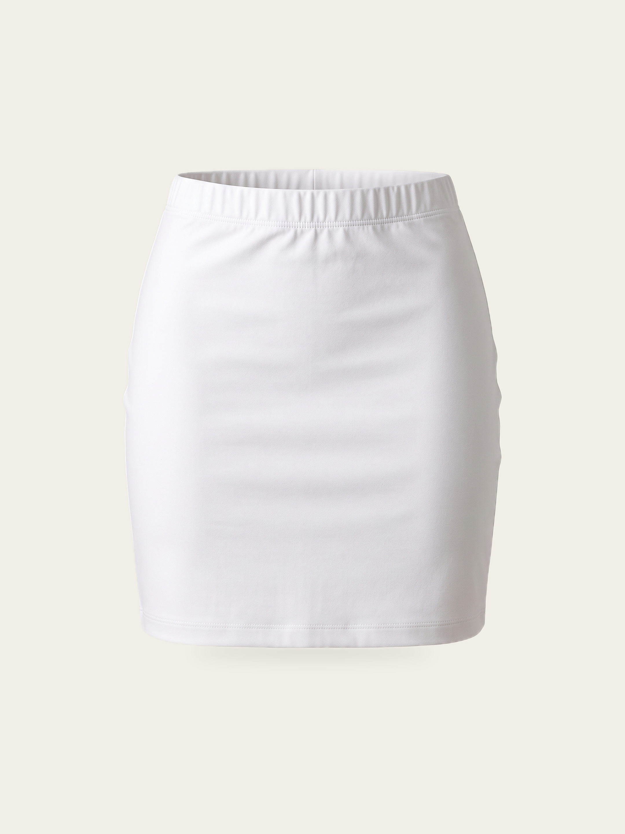 CORE mini skirt in Rui White, product view with the elastic waistband