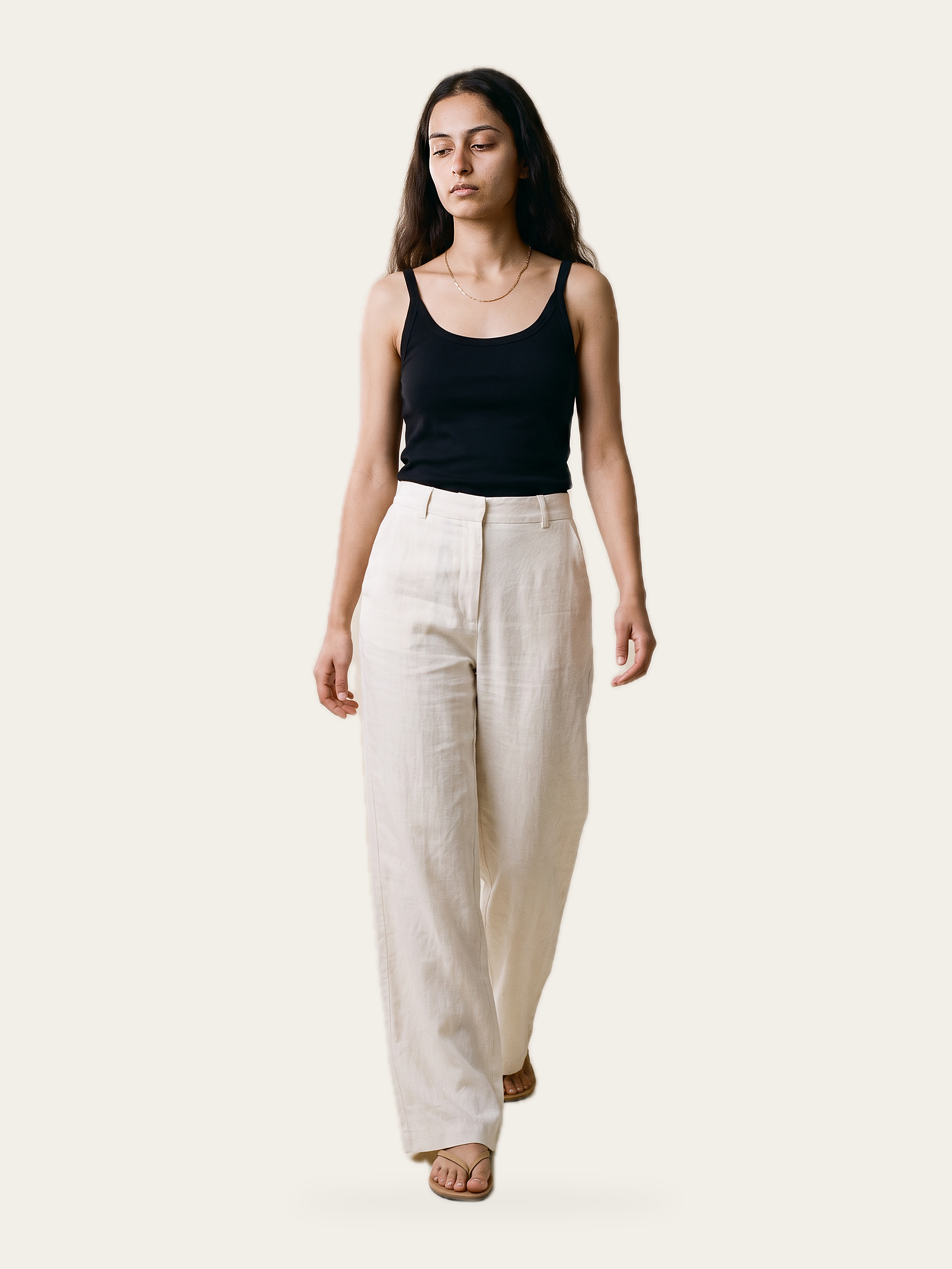 CORE tank in Noor Black, front, with cream linen trousers