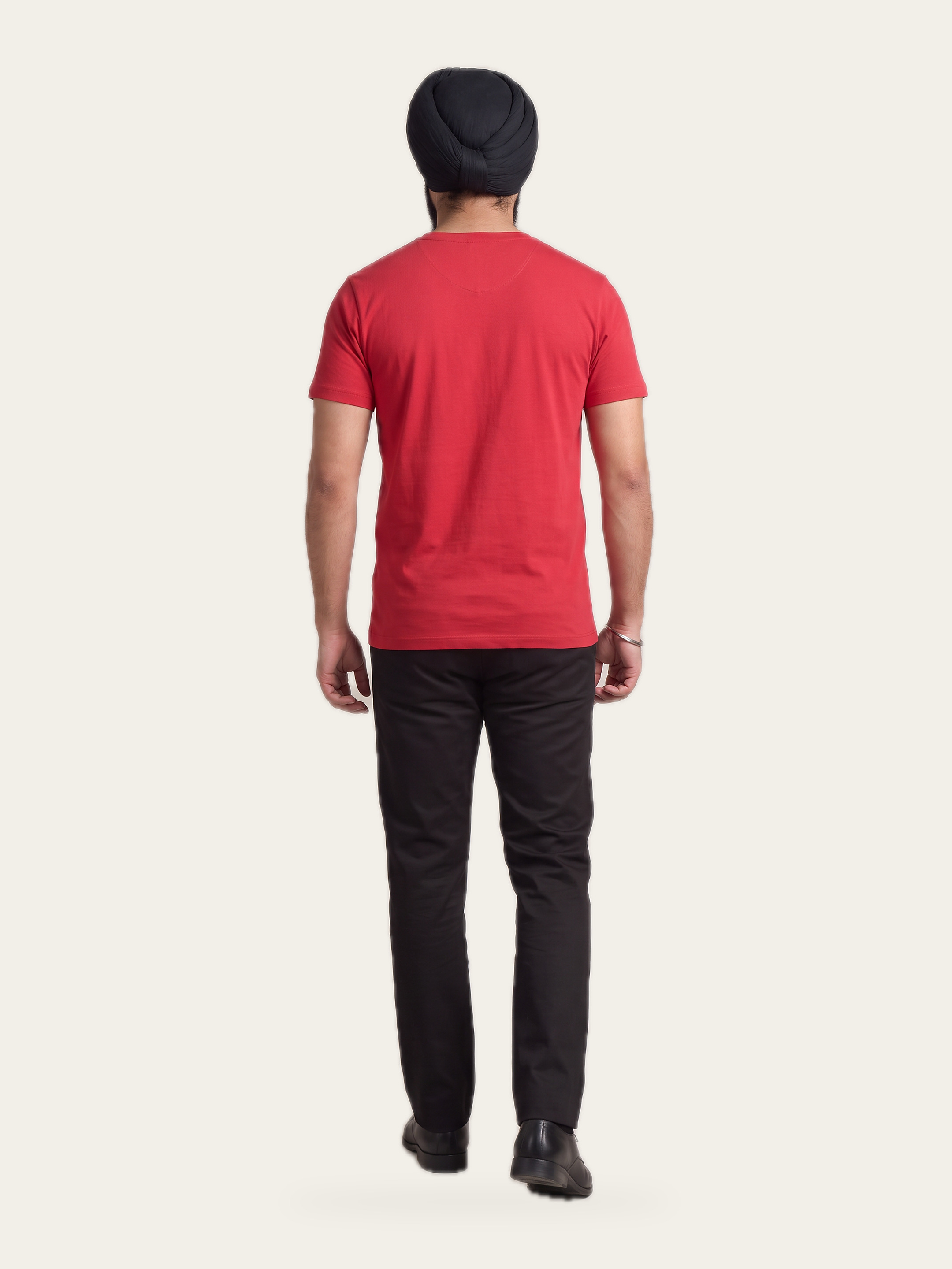 CORE V neck tee in Agni Red, back view, with black trousers