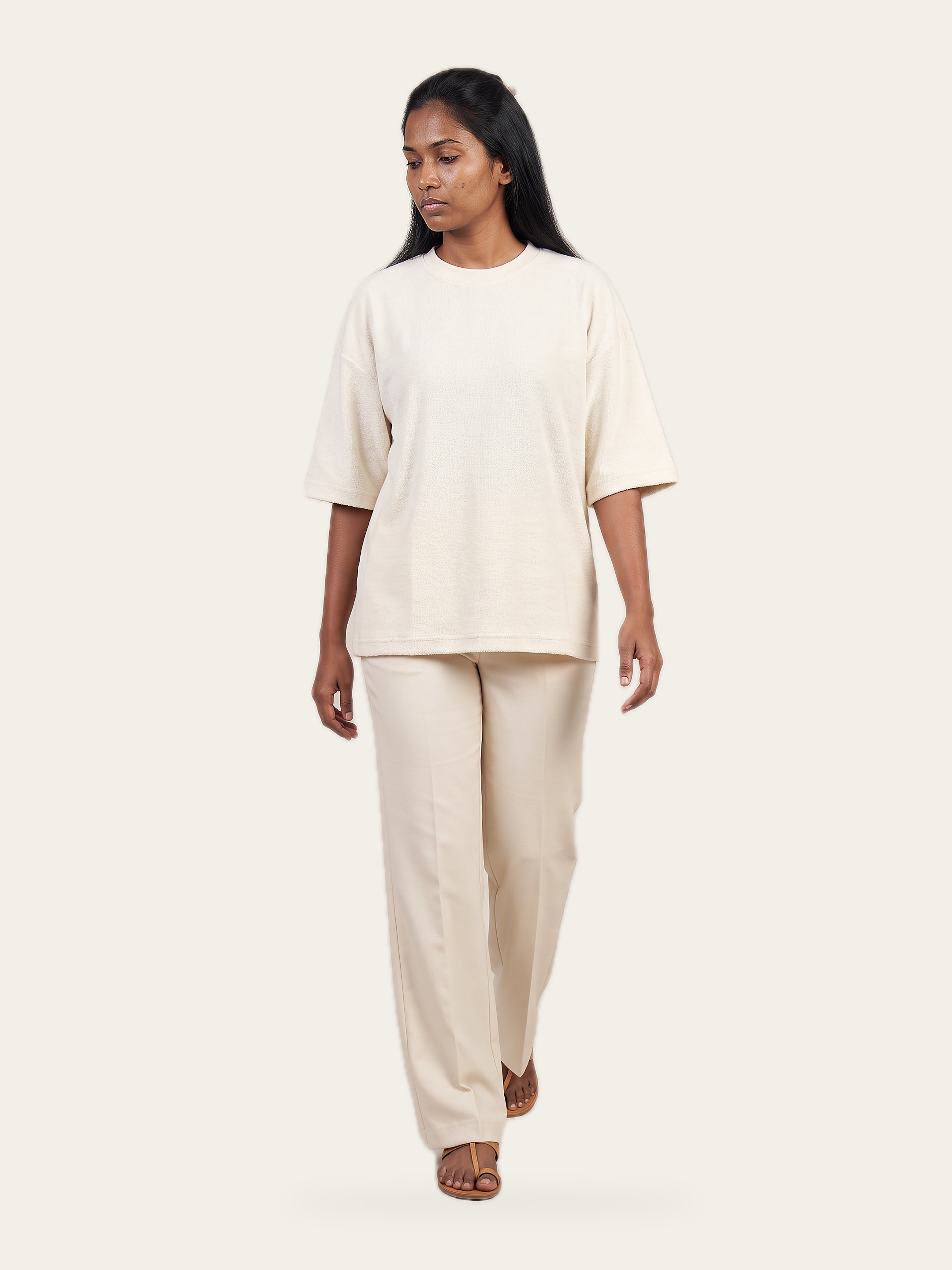 ESSENCE terry tee in Rui White with cream trousers, full length