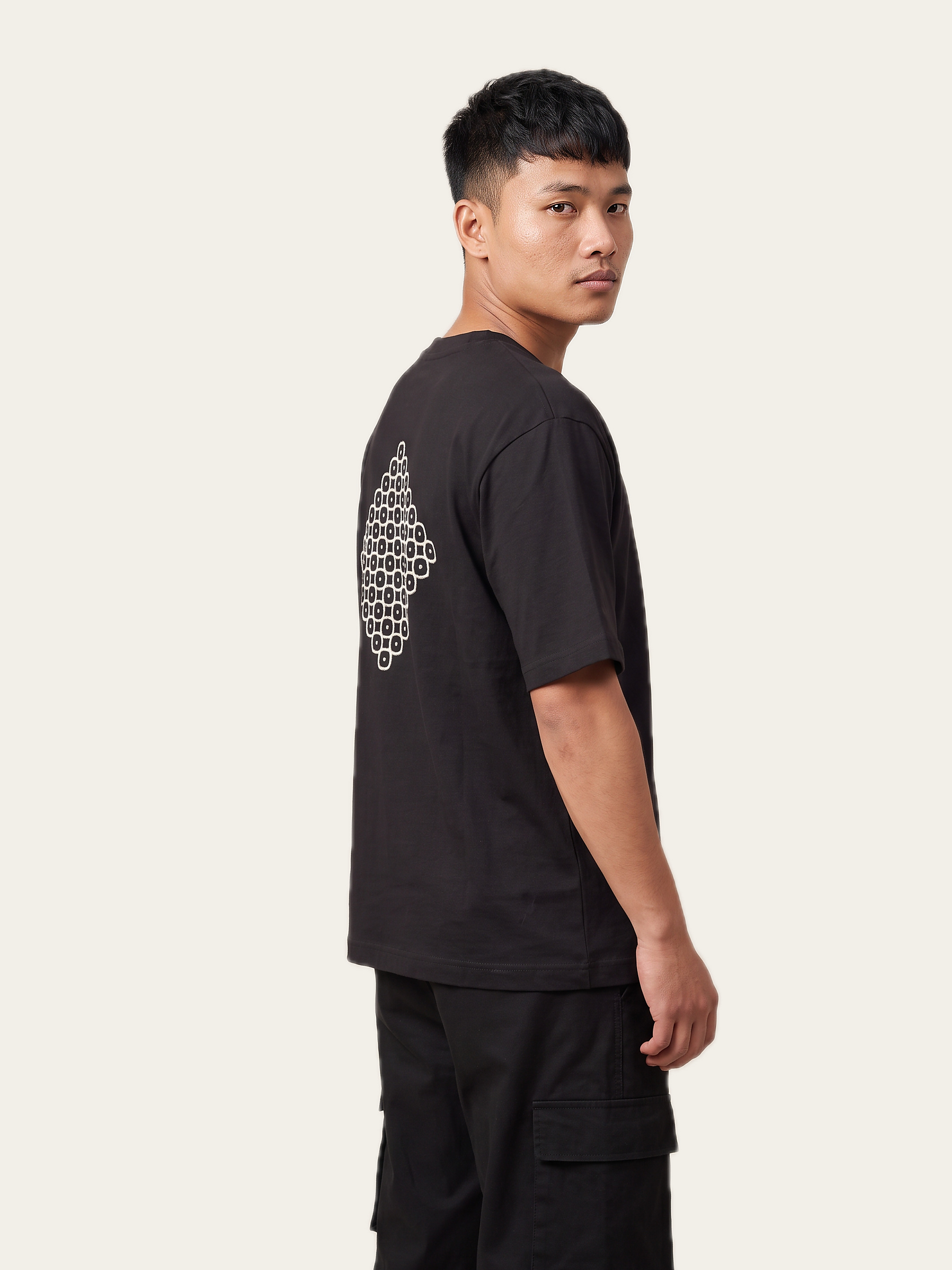 HOSTILU Oversized Tee in Noor Black, printed tee care: wash inside out in cold water