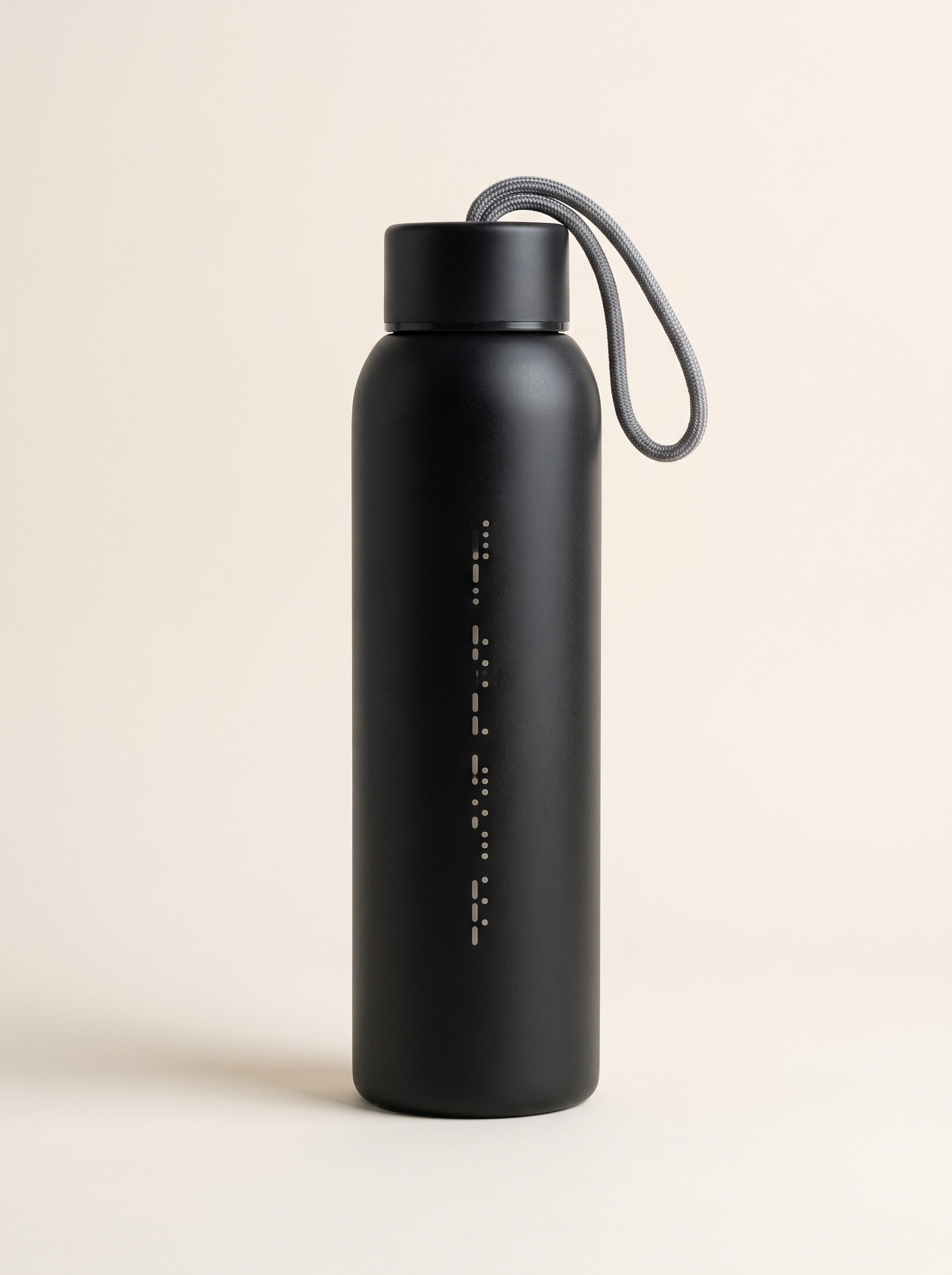 Hydra Bottle in Noor Black, side view with the carry strap