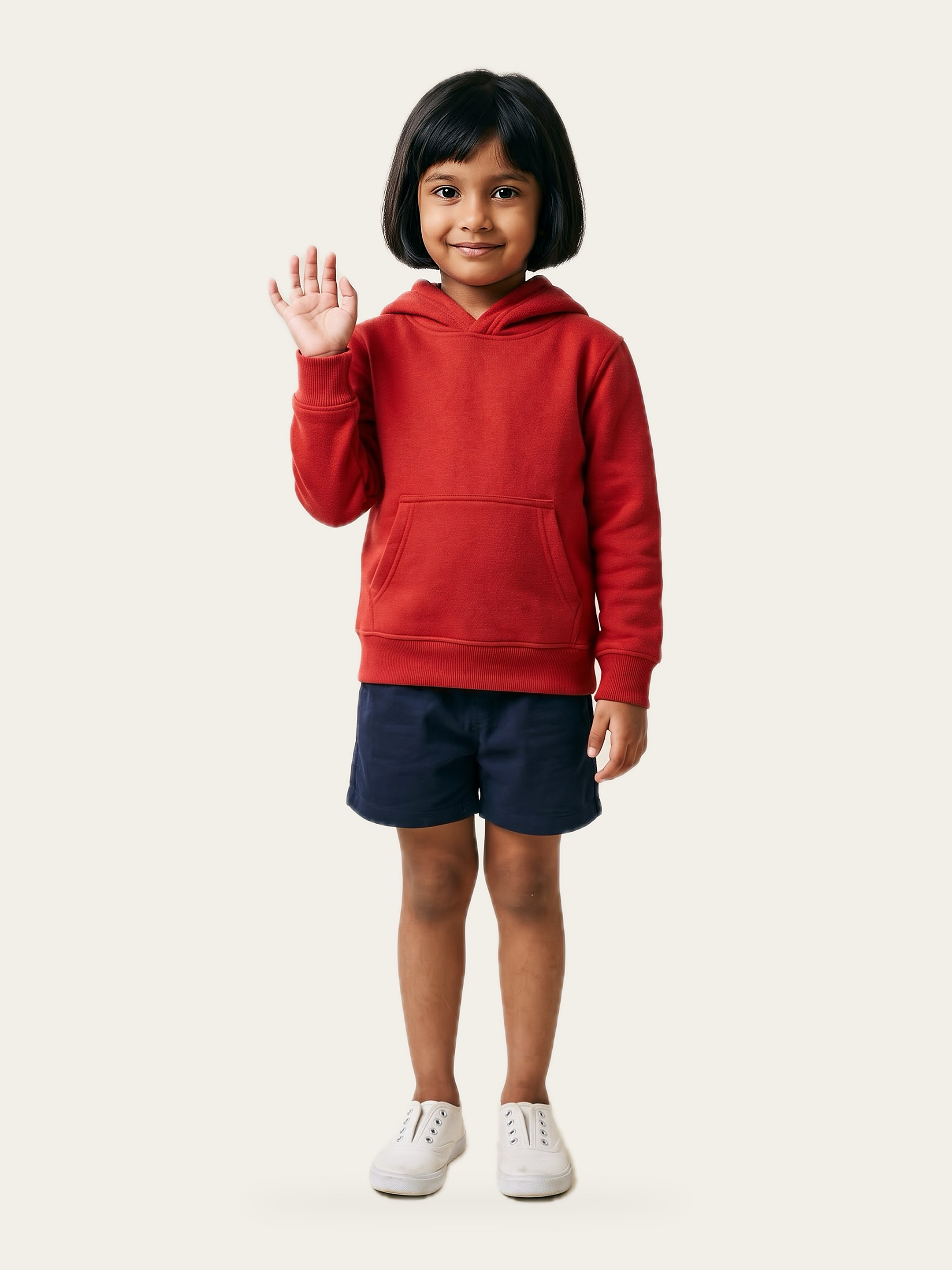 MINI hoodie in Agni Red worn by a smiling child with dark shorts