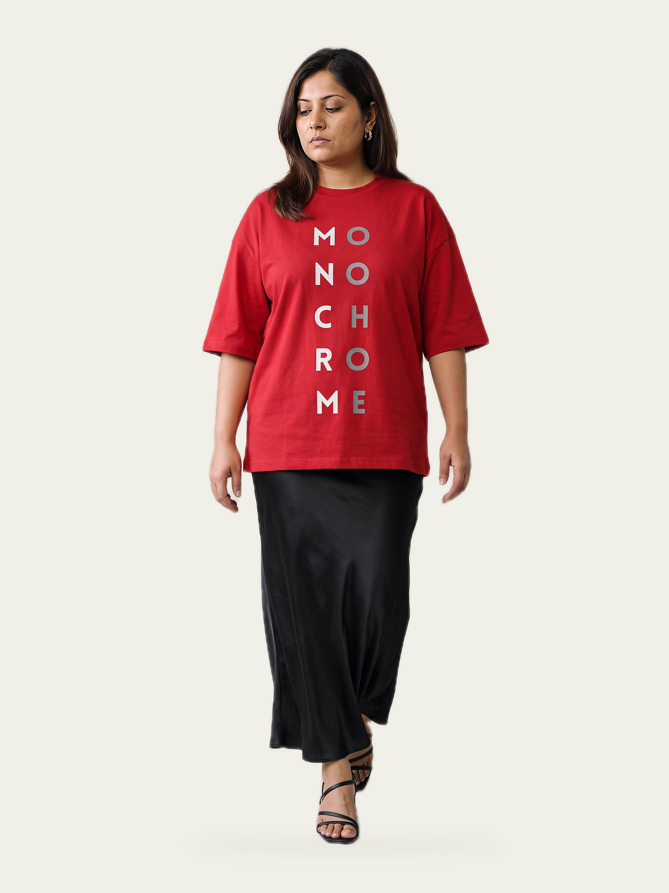 Monochrome oversized tee in Agni Red, front, with vertical typography