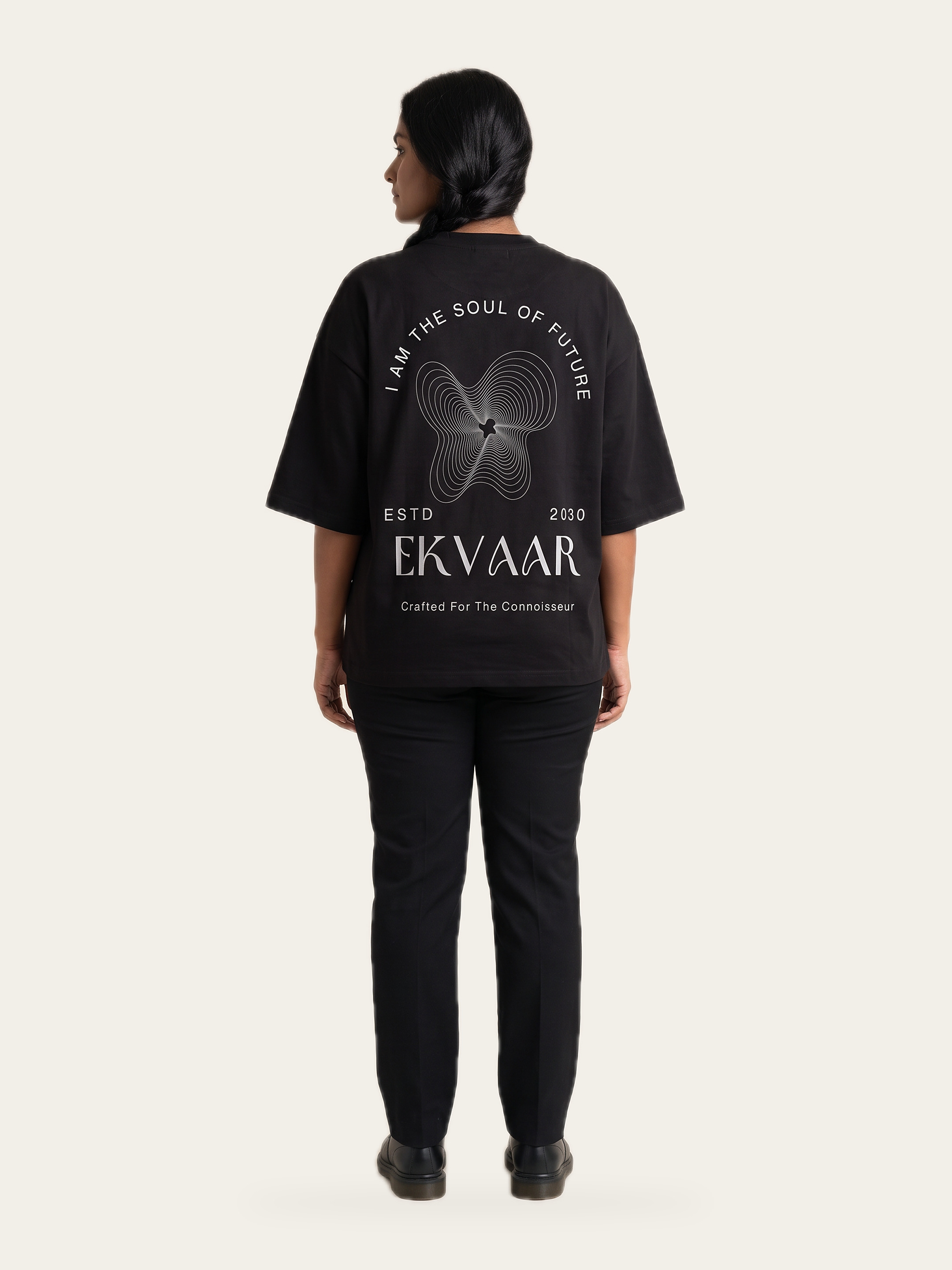 Monochrome oversized tee in Noor Black, back, showing the abstract wave