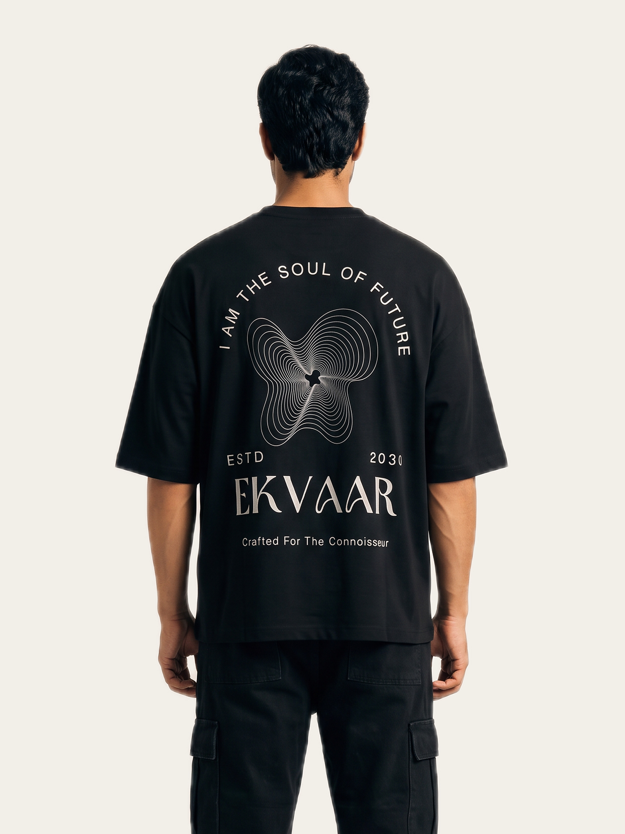 Back view of the Monochrome Oversized Tee in Noor Black with an abstract wave print