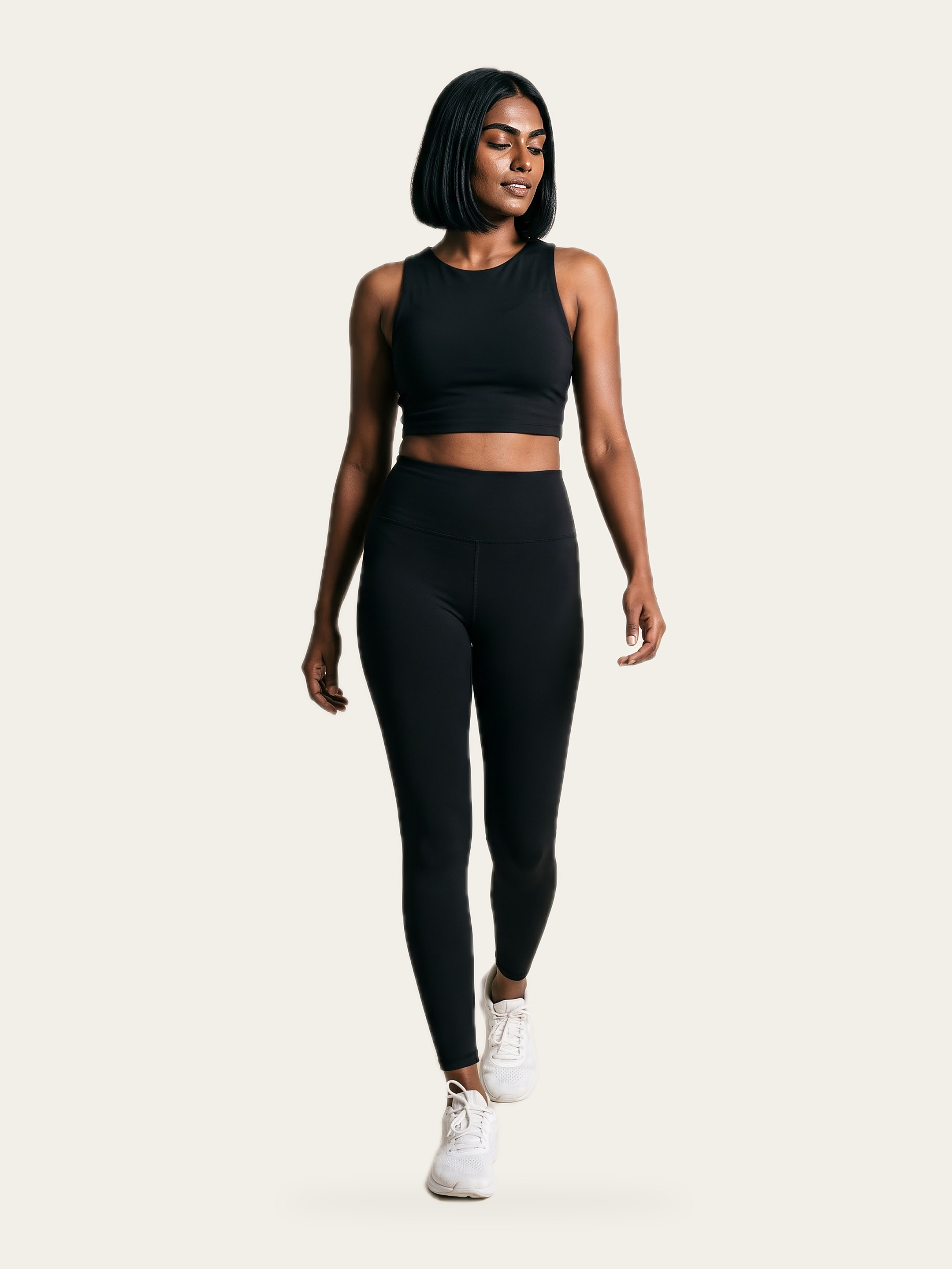 MOVE Sports Crop Top in Noor Black, front, worn by a model