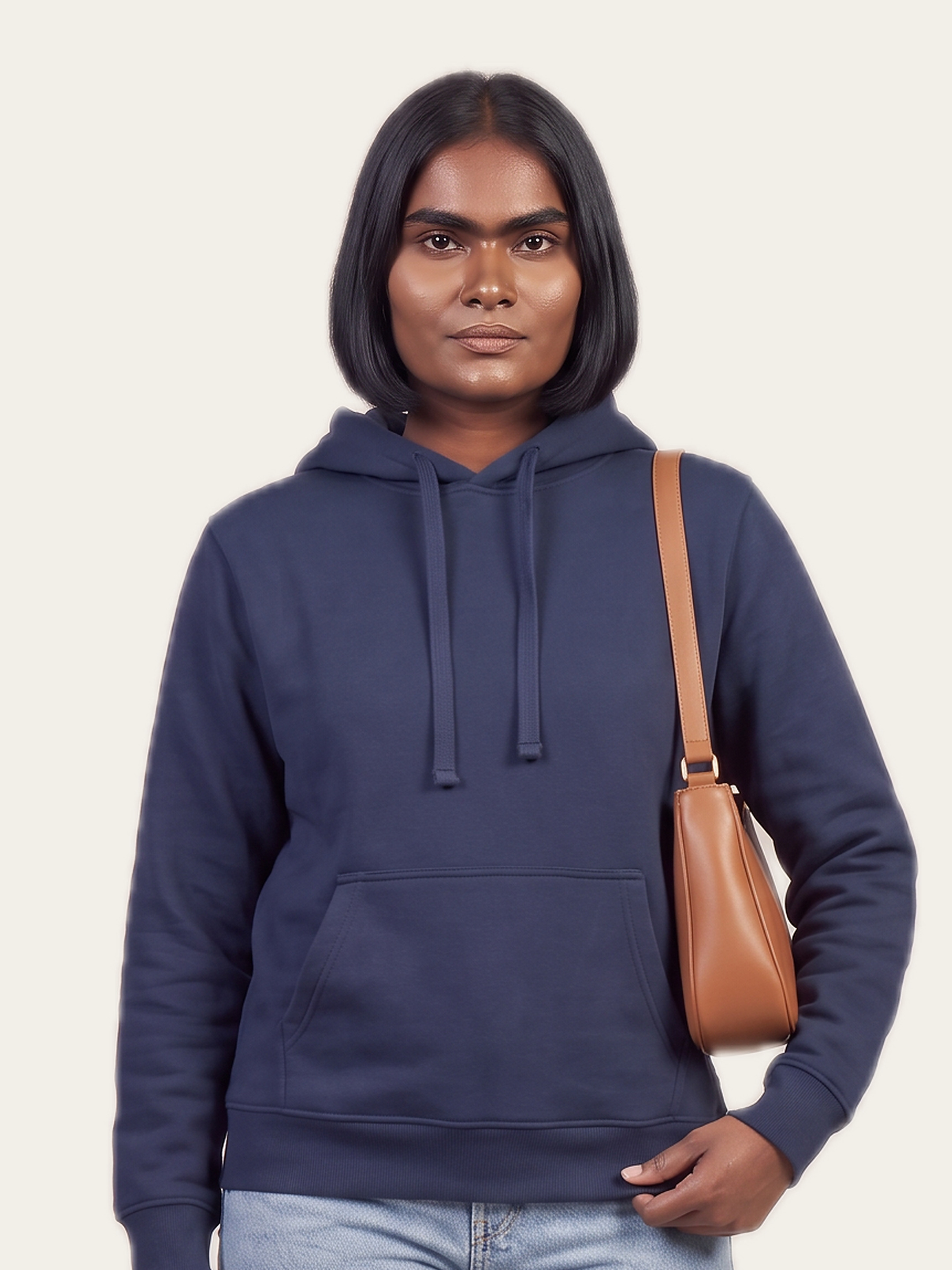 A woman wearing the ORIGINAL Hoodie in Neel Blue, a dark blue that reads almost black indoors