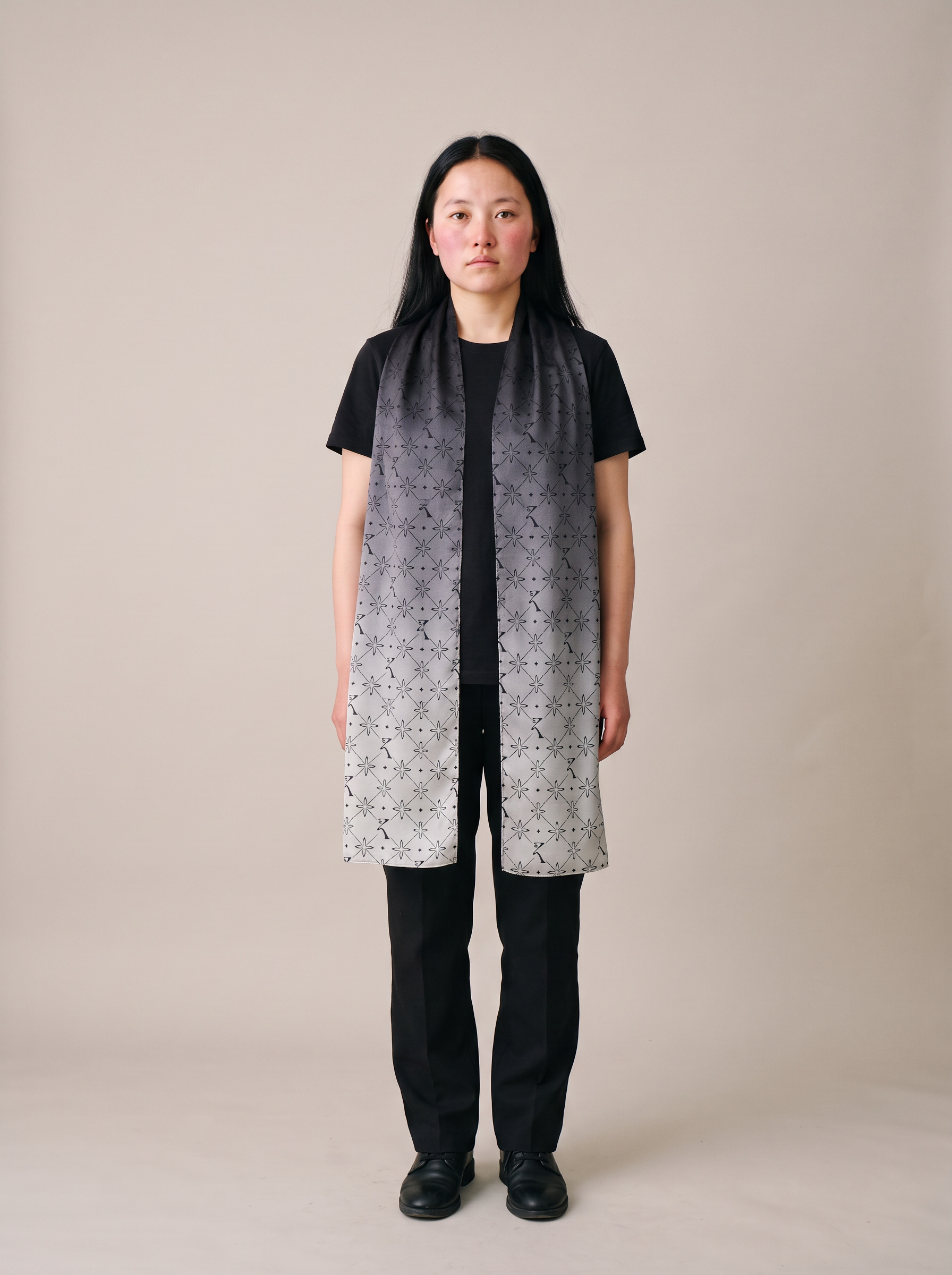 Original Stole in Noor Black worn in a straight drape, the simplest way to style a stole