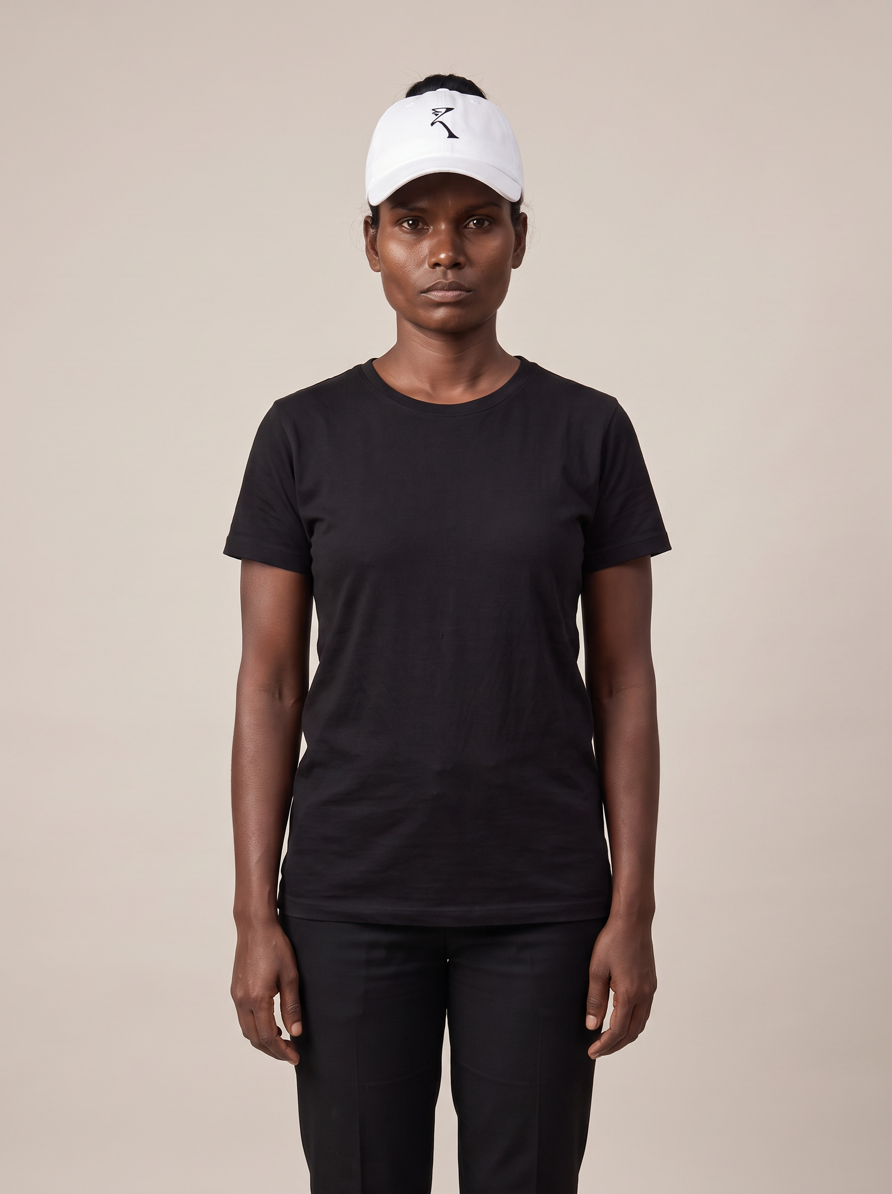 Signature Cap in Rui White worn by a model, a structured cotton drill cap