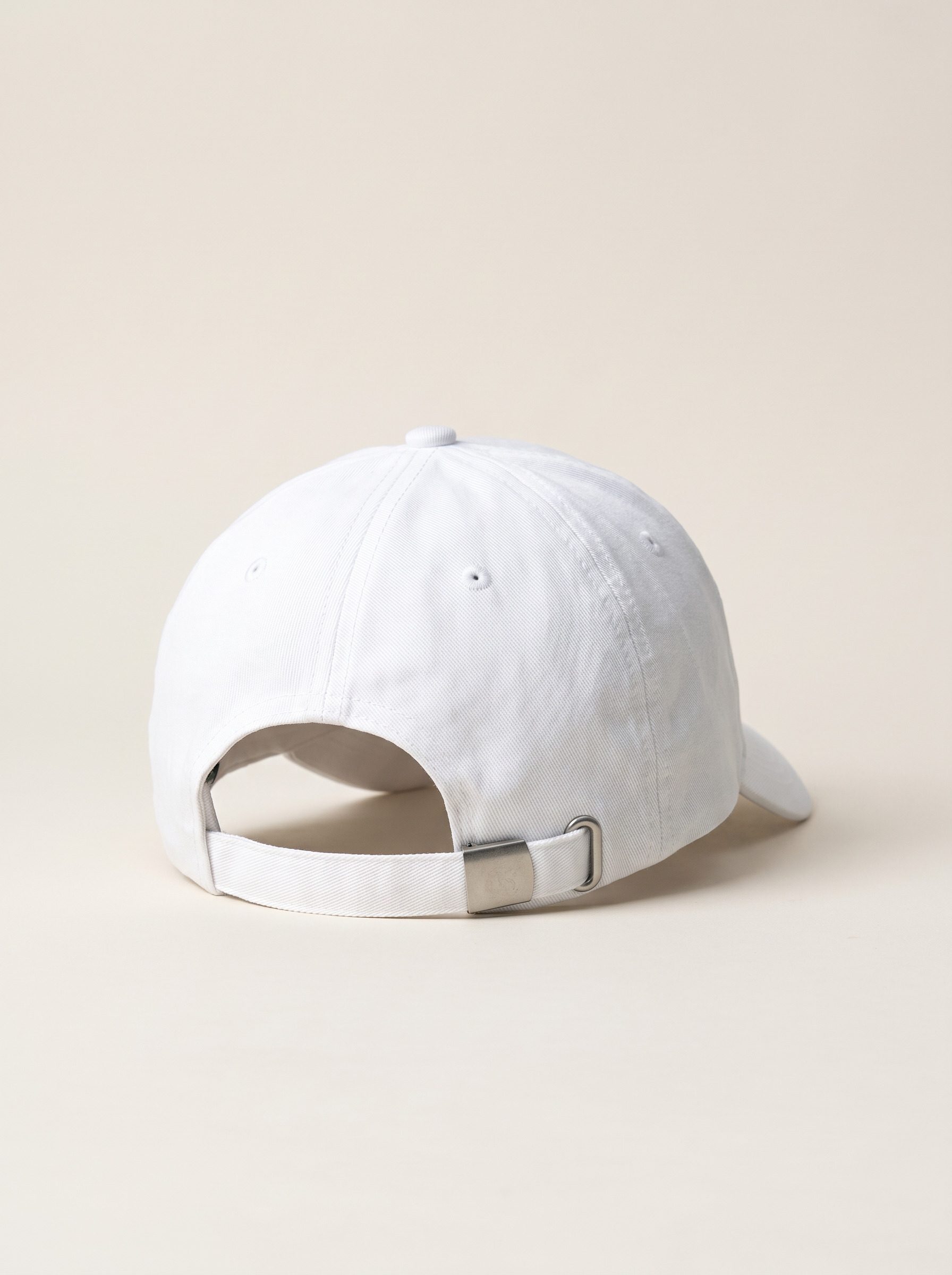 Signature Cap in Rui White from the back, structured cotton drill with an adjustable strap