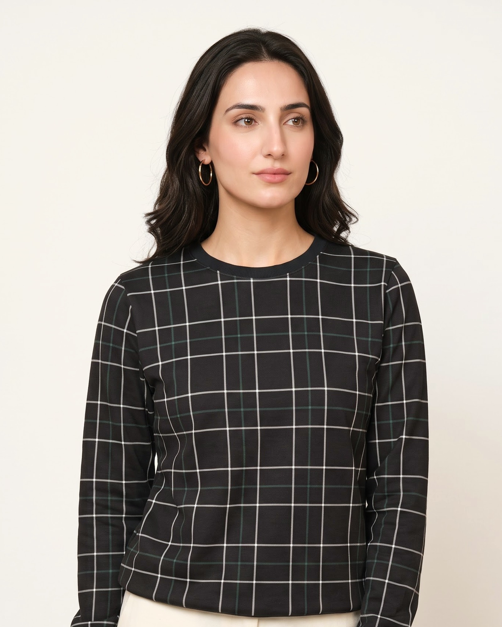 JAALI sweatshirt in Noor Black windowpane check, worn by a model