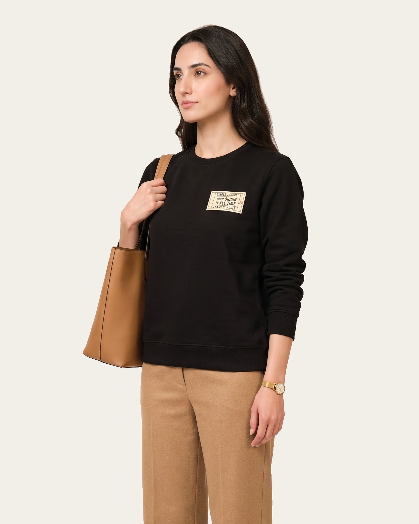 SINGLE JOURNEY sweatshirt in Noor Black, worn with camel trousers